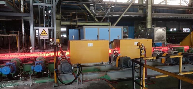 Induction heating system for billet temperature compensation